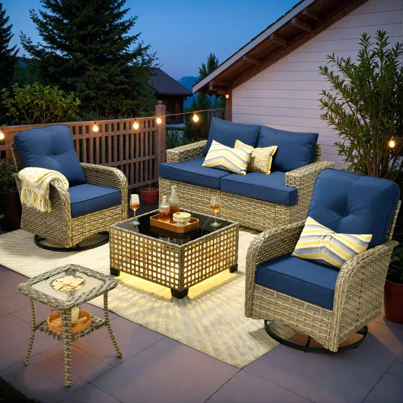 Outdoor 4 - Person Seating Group with Swivel Chairs and Cushions LED Coffee Table